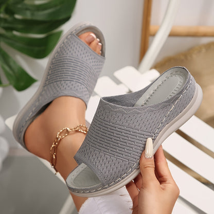 Women's orthopedic wedge slides featuring arch support, comfortable for walking and working.