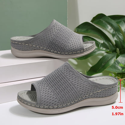 Women's orthopedic wedge slides featuring arch support, comfortable for walking and working.
